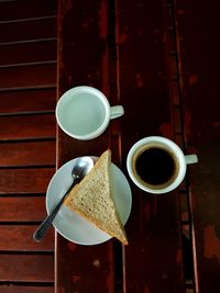 Directly above shot of coffee cup on table