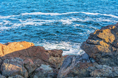 High angle view of rocks on beach