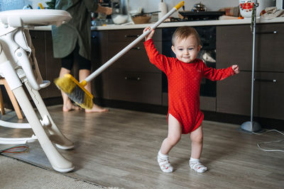 Full length portrait of cute boy standing