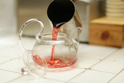 Close-up of wineglass on table