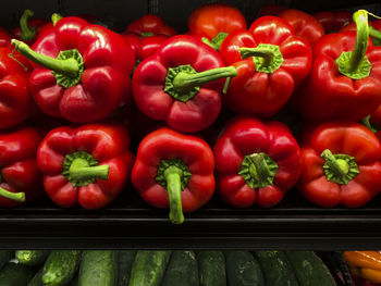 Close-up of red bell peppers for sale in market