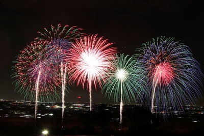 Firework display at night