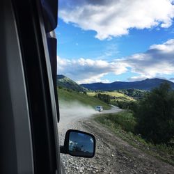 Road seen through car window