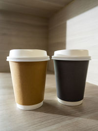 Close-up of coffee cup on table