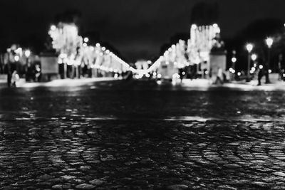 View of fountain in city at night