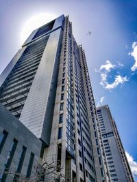 Low angle view of modern buildings against sky