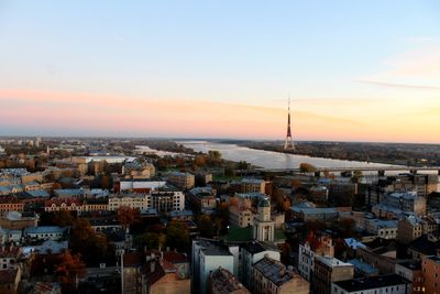 High angle view of city at sunset