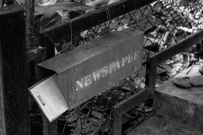 Close-up of abandoned text on wood