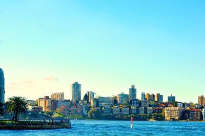 Sea with city in background