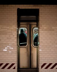 View of window on brick wall