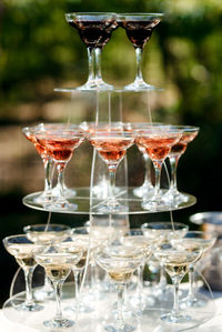 Close-up of wine glasses on table