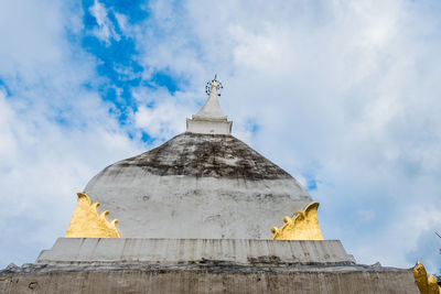 Low angle view of statue of building against sky