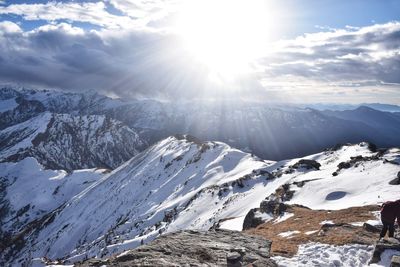 Scenic view of snowcapped mountains against sky