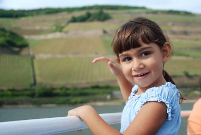 Portrait of cute girl looking away