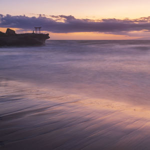 Long exposure morning view of torii gate in the sea at shirahama shrine, izu peninsula, japan