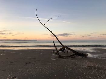 Scenic view of sea against sky at sunset