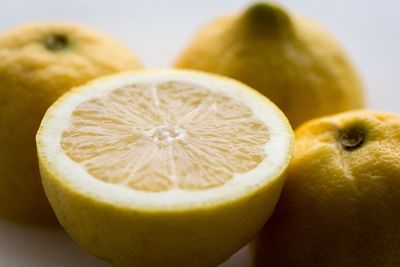 Close-up of fruits against white background