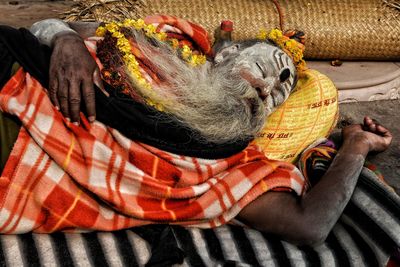 High angle view of man sleeping