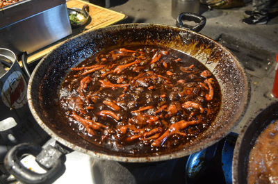 High angle view of meat in cooking pan