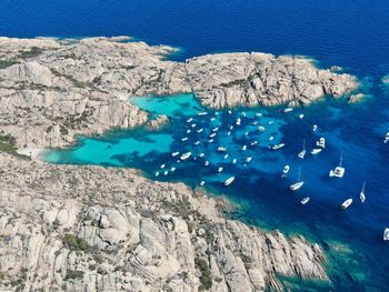 High angle view of rocks in sea