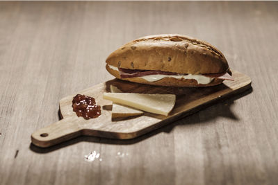 High angle view of bread on cutting board