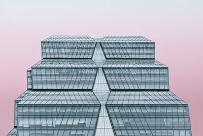 Low angle view of modern building against clear sky