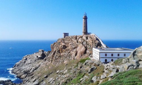 View of lighthouse against blue sky
