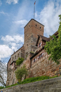 Low angle view of old building against sky