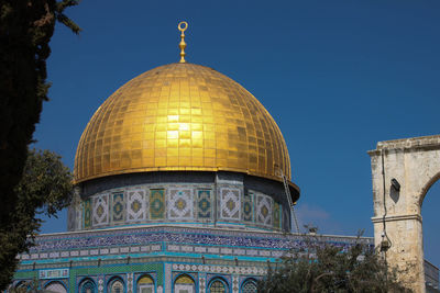 Low angle view of dome of the rock against sky