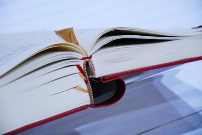 Close-up of open bible on table