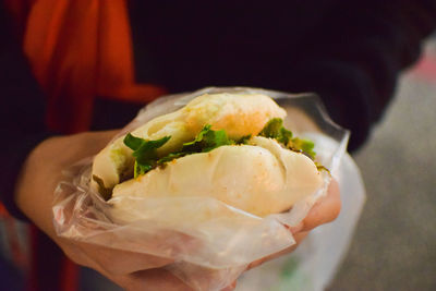 Close-up of hand holding ice cream
