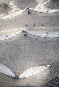 High angle view of tire tracks on floor