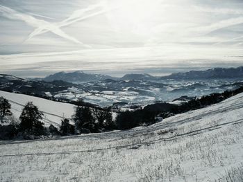 Scenic view of snow covered mountains