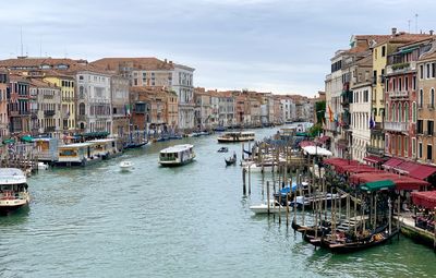 Boats moored at harbor