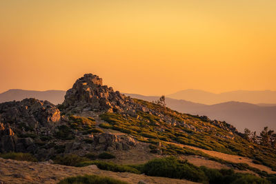 Scenic view of mountains against sky during sunset