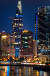 Illuminated buildings in city at night