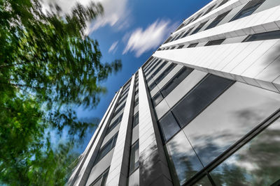 Low angle view of modern building against sky