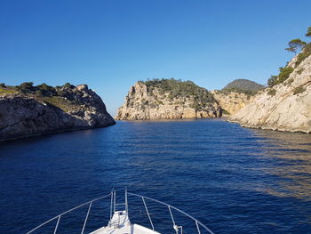 Scenic view of sea against clear blue sky