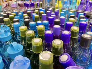 High angle view of various bottles on shelf