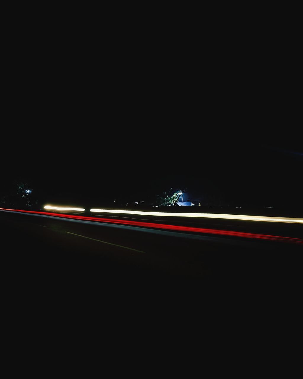 light trail, night, illuminated, motion, transportation, long exposure, speed, mode of transportation, no people, car, copy space, motor vehicle, tail light, road, blurred motion, darkness, light, line, land vehicle, city, on the move, light - natural phenomenon, screenshot, lighting equipment, dark