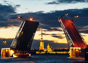 View of illuminated city at sunset