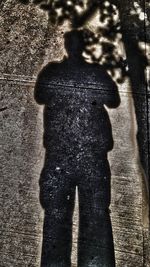 Shadow of people on road