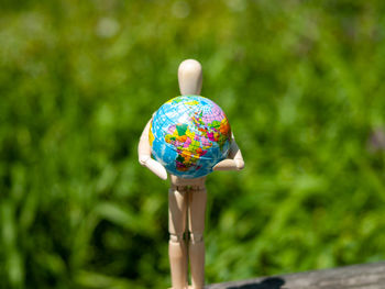 Close-up of multi colored ball in park