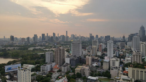 Cityscape against sky during sunset