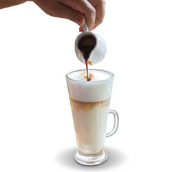 Glass of coffee cup against white background