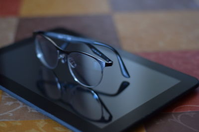 Close-up of eyeglasses on table