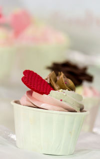 Close-up of cupcakes on table