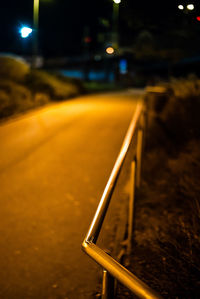 Illuminated road at night