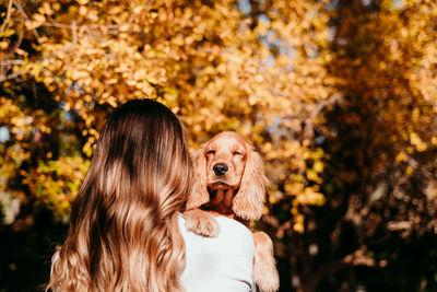 Woman with dog at park