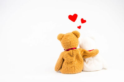 Close-up of stuffed toy against white background